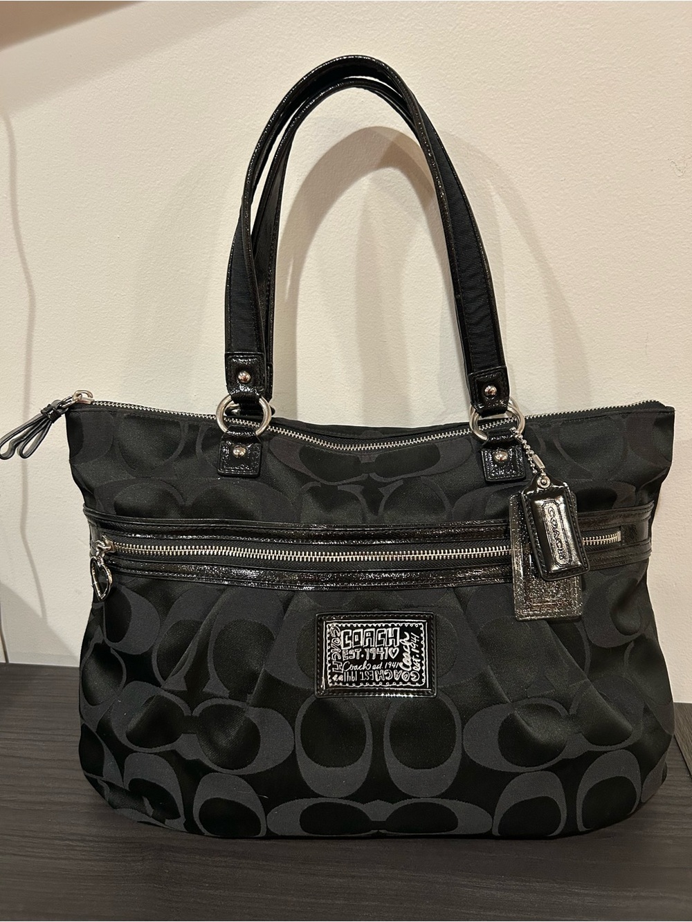Coach Poppy Daisy Signature Tote in black canvas EUC